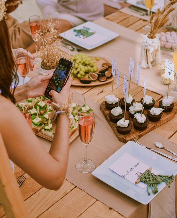 woman sharing favorite dessert on smartphone